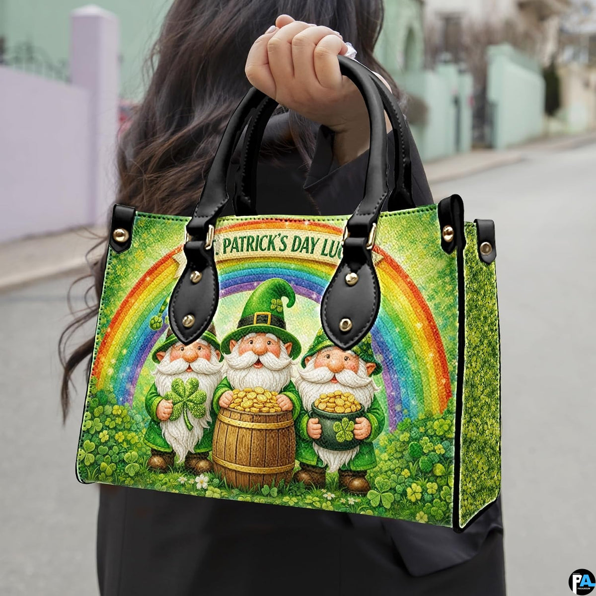 Model carrying three leprechaun handbag with rainbow and gold coins