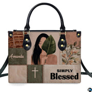 Side profile view of structured boho botanical portrait patchwork handbag.