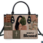 Side profile view of structured boho botanical portrait patchwork handbag.