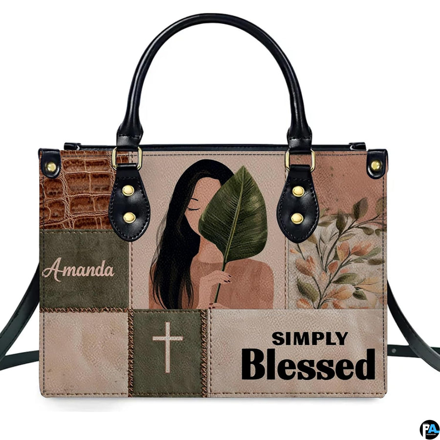 Side profile view of structured boho botanical portrait patchwork handbag.