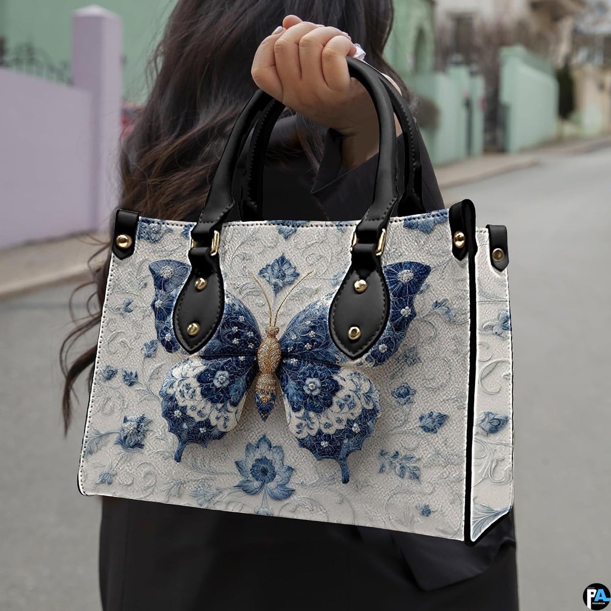 Angled view of matching porcelain butterfly set showcasing embossed ceramic vine relief details