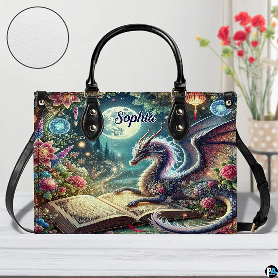 Front view of celestial dragon handbag on white tabletop with circular textured exterior swatch.