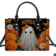 Front view presenting charming lace ghost artwork encircled by radiant orange marigolds and monarch butterflies.