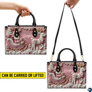 Dual demonstration of handbag held by hand and worn with long shoulder strap.