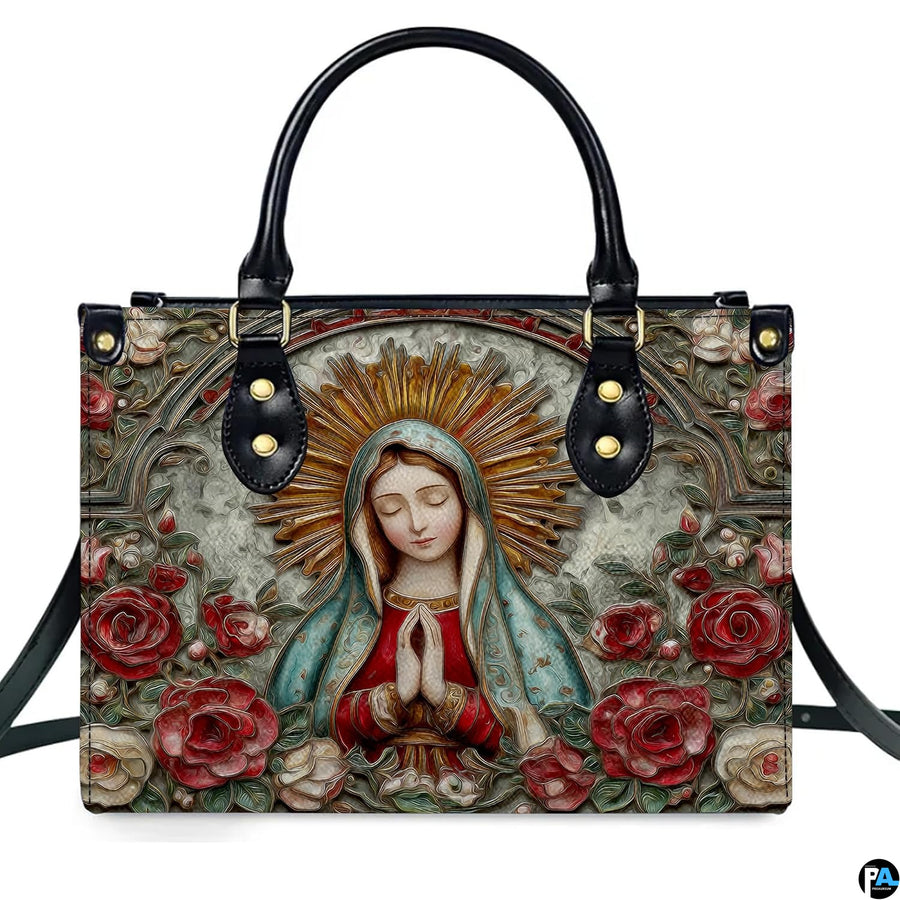 Front isolated view of Guadalupe handbag highlighting sunburst halo and sculpted roses.