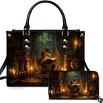 Candlelit alchemist study dragon handbag and wallet set displayed against a white studio background