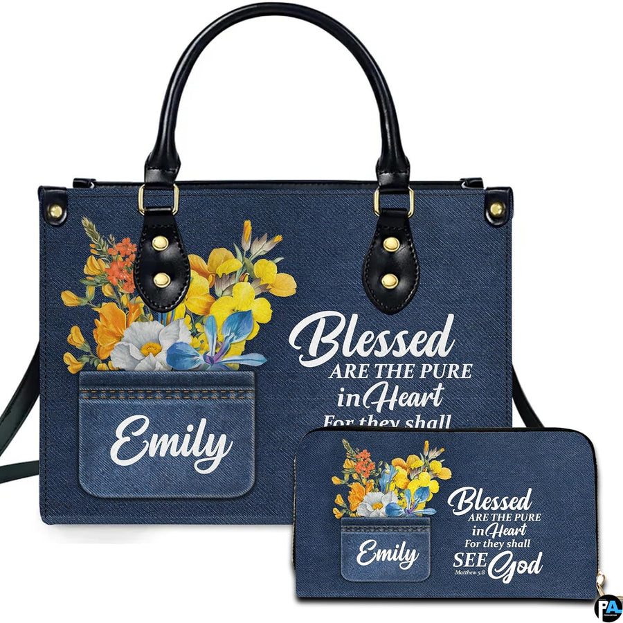 Front view of scripture denim wildflower handbag and matching zip wallet on solid white background