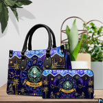 Celestial Maiden Satchel Handbag and companion continental wallet displayed beside indoor plant.