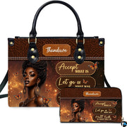 Front view of black queen butterfly art showcasing queen portrait, monarch butterflies, and quote plaques.