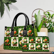 Green leprechaun collage handbag and matching wallet on table