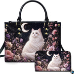 Studio presentation showing celestial white cat artwork alongside matching companion accessory on white surface.