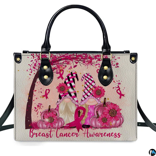Pink ribbon art accessory showcasing whimsical gnomes, pink pumpkins, and sunflowers under an autumn tree.