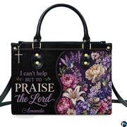 Side perspective of purple hummingbird floral handbag showing structured shape