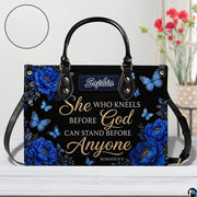 Top view showing carrying handles and zippered opening of royal blue floral purse.