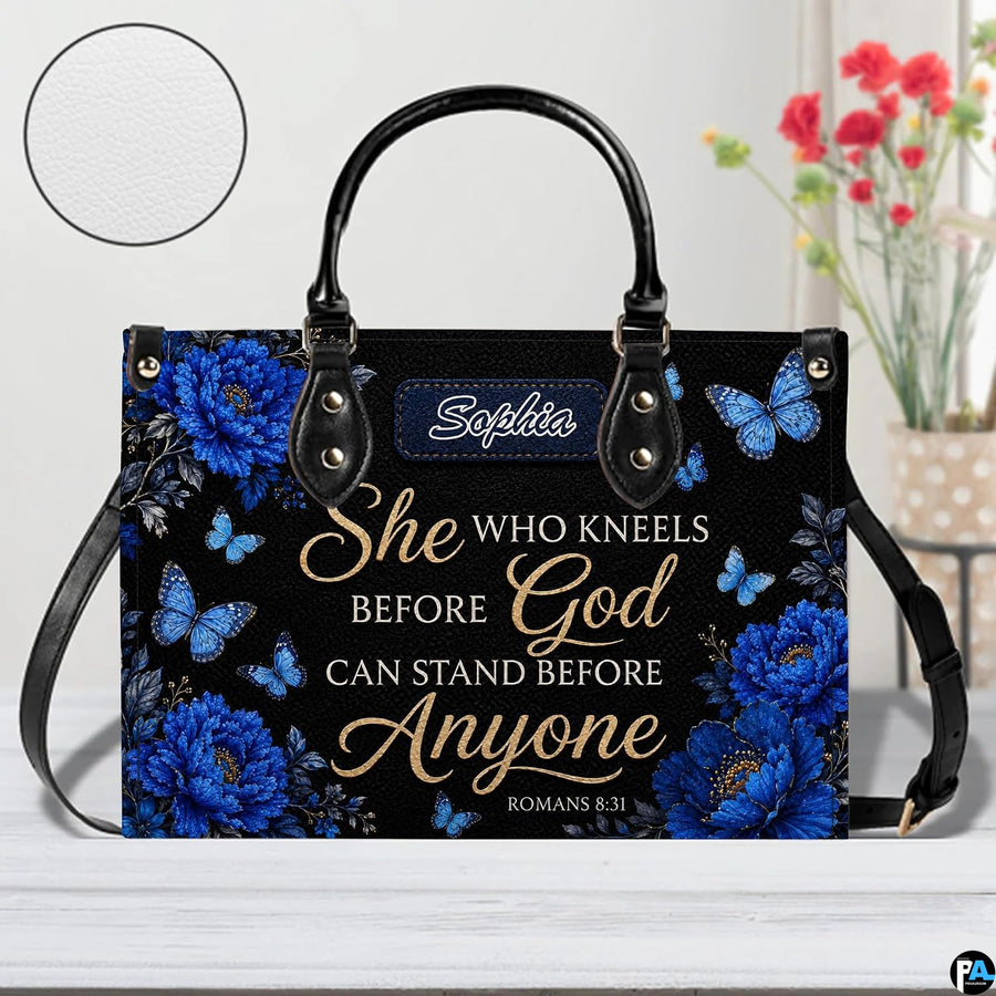 Top view showing carrying handles and zippered opening of royal blue floral purse.