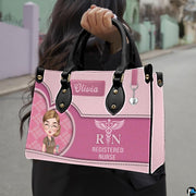 Chibi nurse handbag held outdoors demonstrating visual scale against neutral street background.