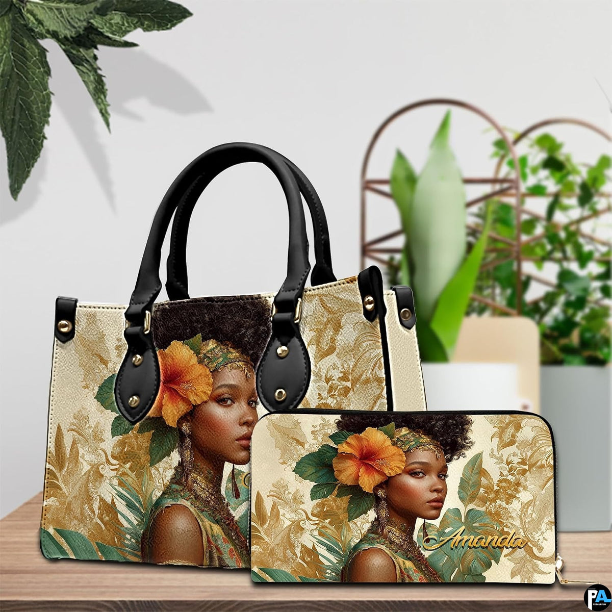 Coordinated indoor arrangement displaying tropical portrait artwork and companion accessory beside greenery.