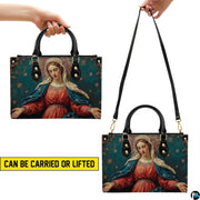 Handbag presented showing shoulder and top carry styling perspectives
