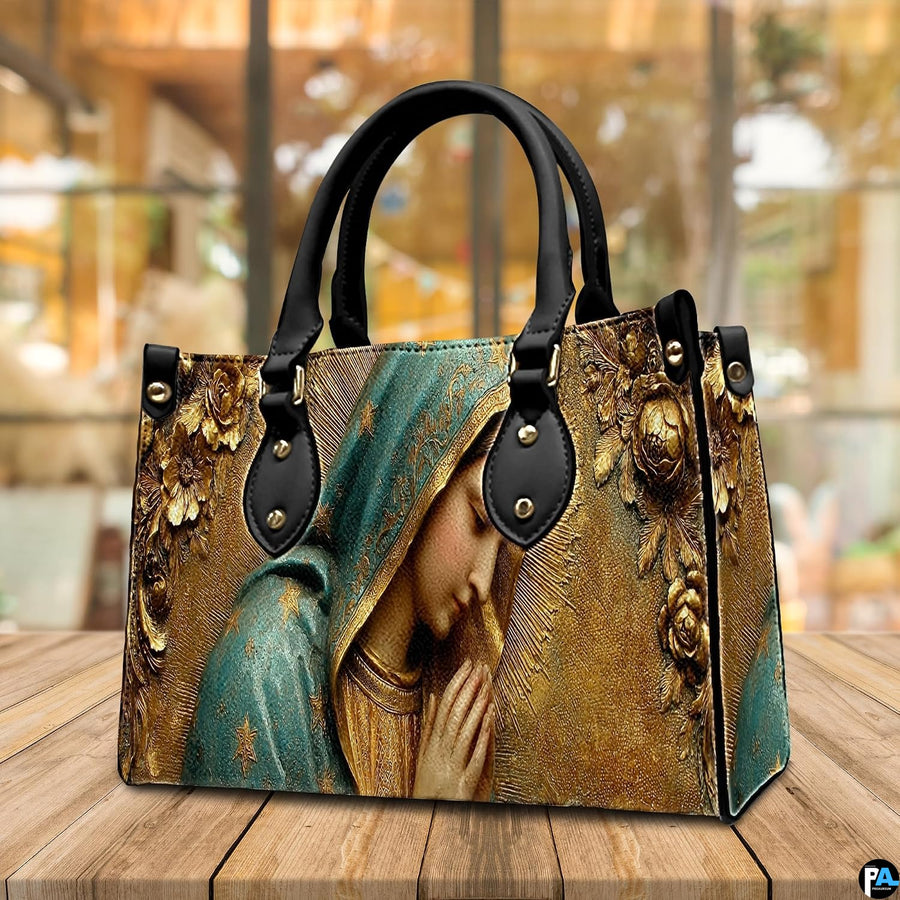 Complete matching handbag and wallet set in sculpted golden Virgin Mary arrangement
