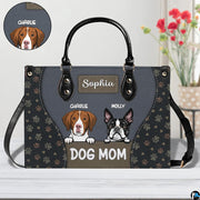 Detailed perspective of illustrated hound and bulldog characters on slate panel with paw graphics.