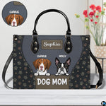 Detailed perspective of illustrated hound and bulldog characters on slate panel with paw graphics.
