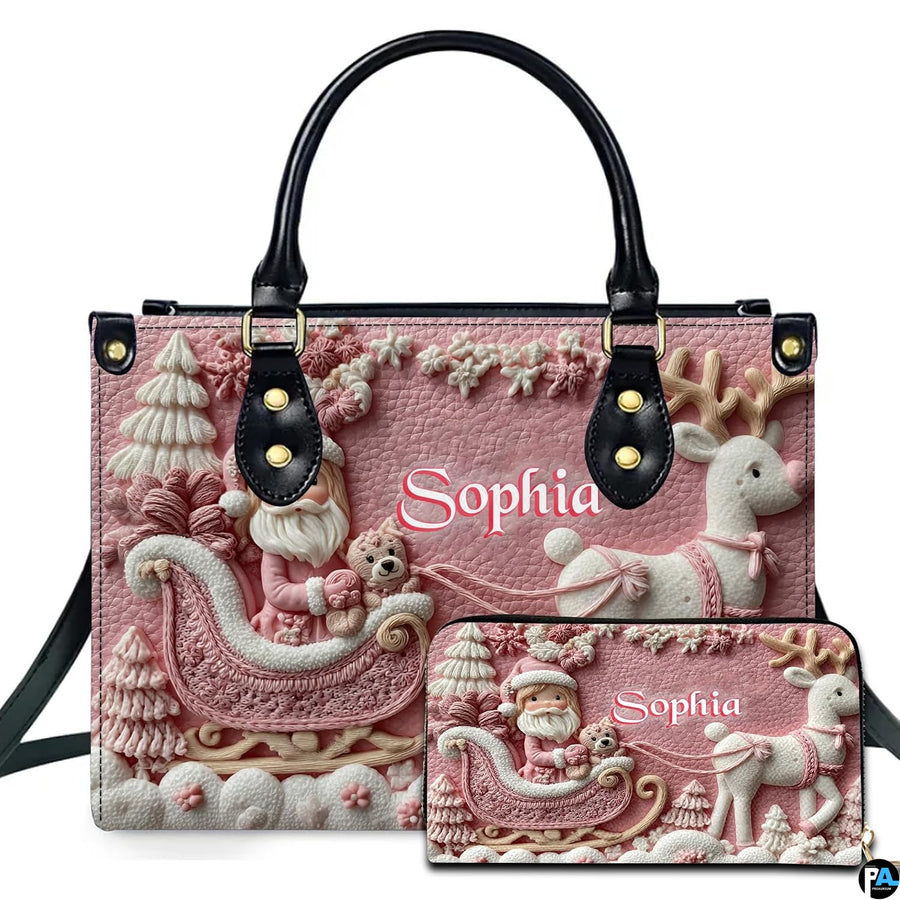 Front view of pastel pink Santa sleigh handbag and matching zip-around wallet.