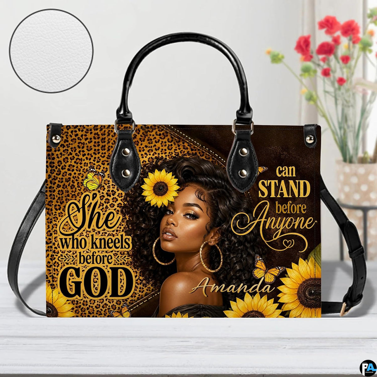 African American faith sunflower art presented on a studio surface beside vibrant floral blossoms.