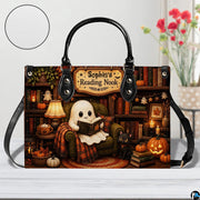 Tabletop perspective of autumn library satchel placed beside a floral vase with circular texture inset.