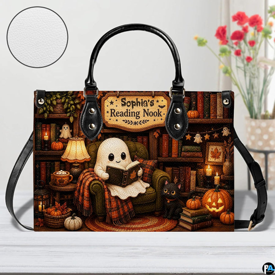 Tabletop perspective of autumn library satchel placed beside a floral vase with circular texture inset.