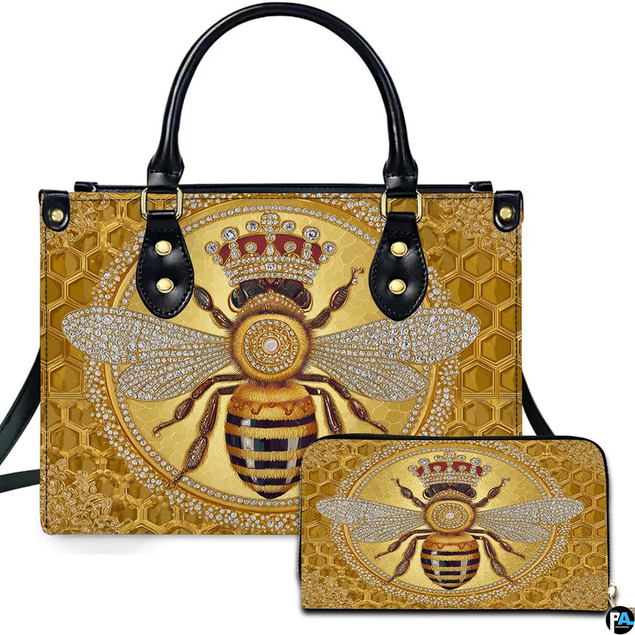 Crowned honey bee handbag and matching wallet set with golden honeycomb pattern.