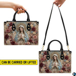 Hand carry and shoulder wear configurations demonstrated for the baroque Virgin Mary handbag