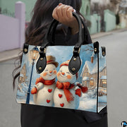 Macro close-up highlighting fine artistic details in the snowmen's blushing smiles, heart buttons, and lamp.