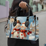 Macro close-up highlighting fine artistic details in the snowmen's blushing smiles, heart buttons, and lamp.