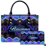 Studio view of Celestial Mandala Satchel Handbag paired with matching companion continental wallet.