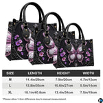 Side profile of gothic butterfly handbag showing continuous floral and filigree pattern along gusset