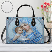 Jeweled Madonna handbag displayed with matching continental wallet