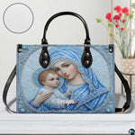 Jeweled Madonna handbag displayed with matching continental wallet