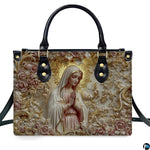 Side perspective of alabaster mary handbag showing structured black profile and curved top carrying handles.