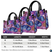 Coordinated display showing both handbag and wallet with matching butterfly graphics.