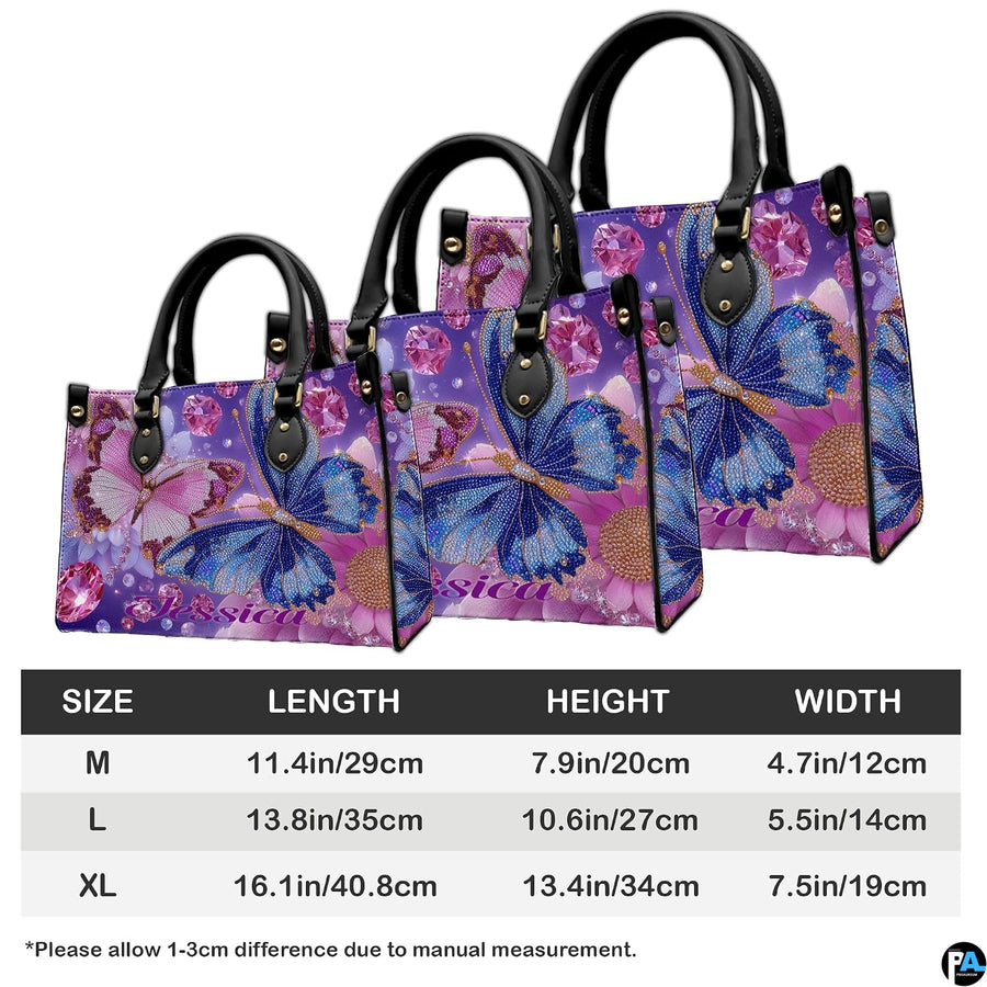 Coordinated display showing both handbag and wallet with matching butterfly graphics.