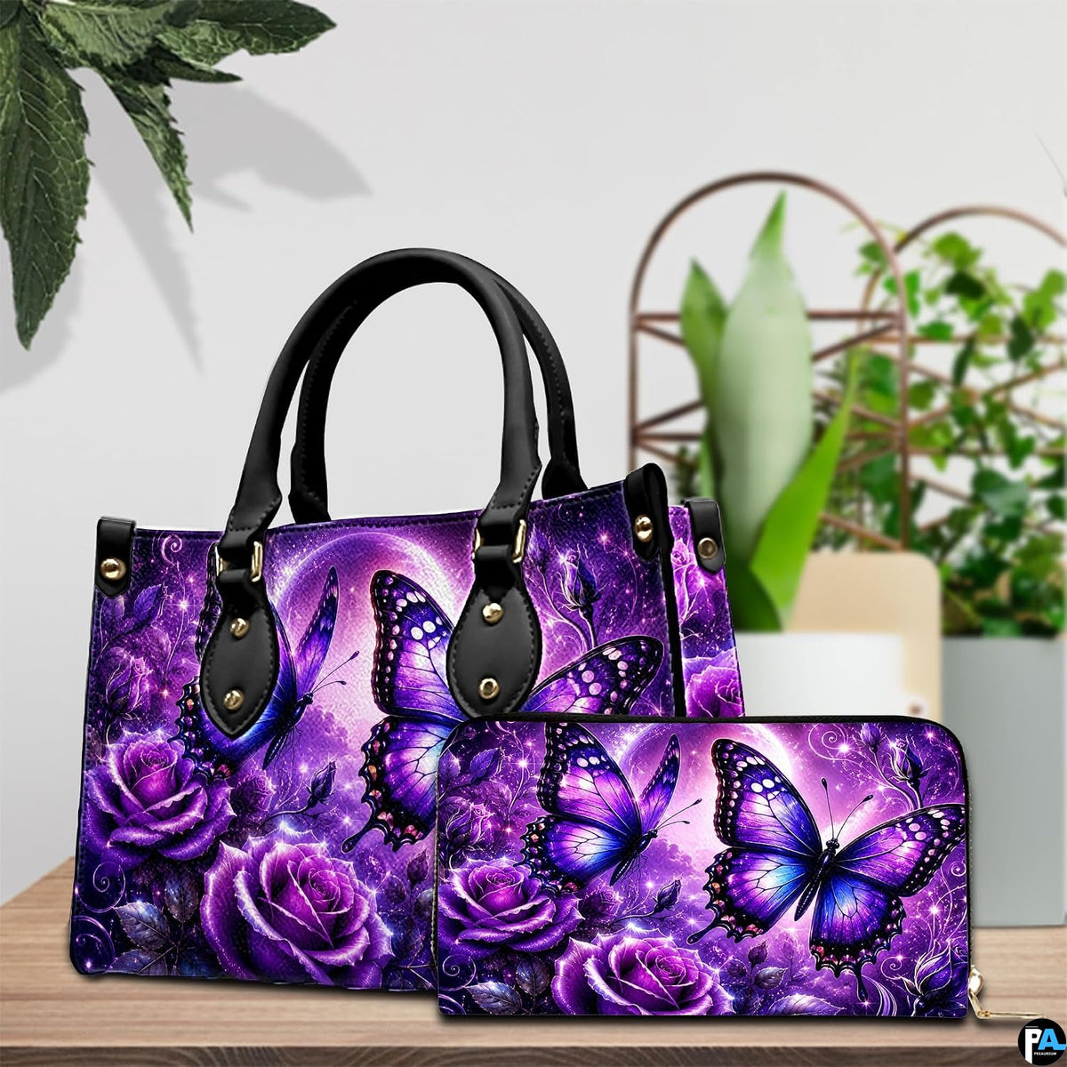 Close-up front view of handbag showing moonlight butterfly artwork