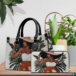 Matching botanical fashion accessories arranged together on a wooden tabletop next to indoor potted greenery.