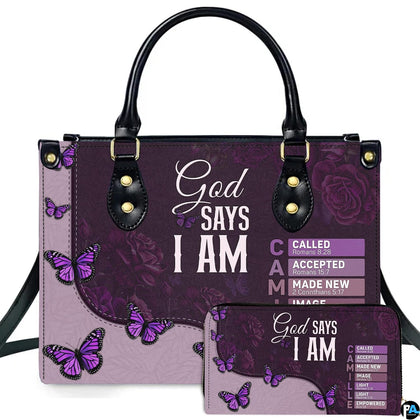 Front view of purple butterfly faith handbag and matching wallet featuring devotional scripture art.