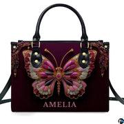 Model carrying jeweled butterfly handbag and matching wallet demonstrating scale