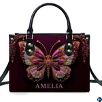 Model carrying jeweled butterfly handbag and matching wallet demonstrating scale