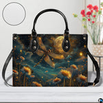 Front view of celestial dragonfly handbag on white table with floral vase and texture swatch inset