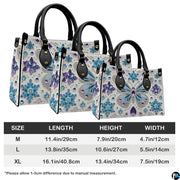 Interior compartment view of butterfly handbag showing inner lining and organization.