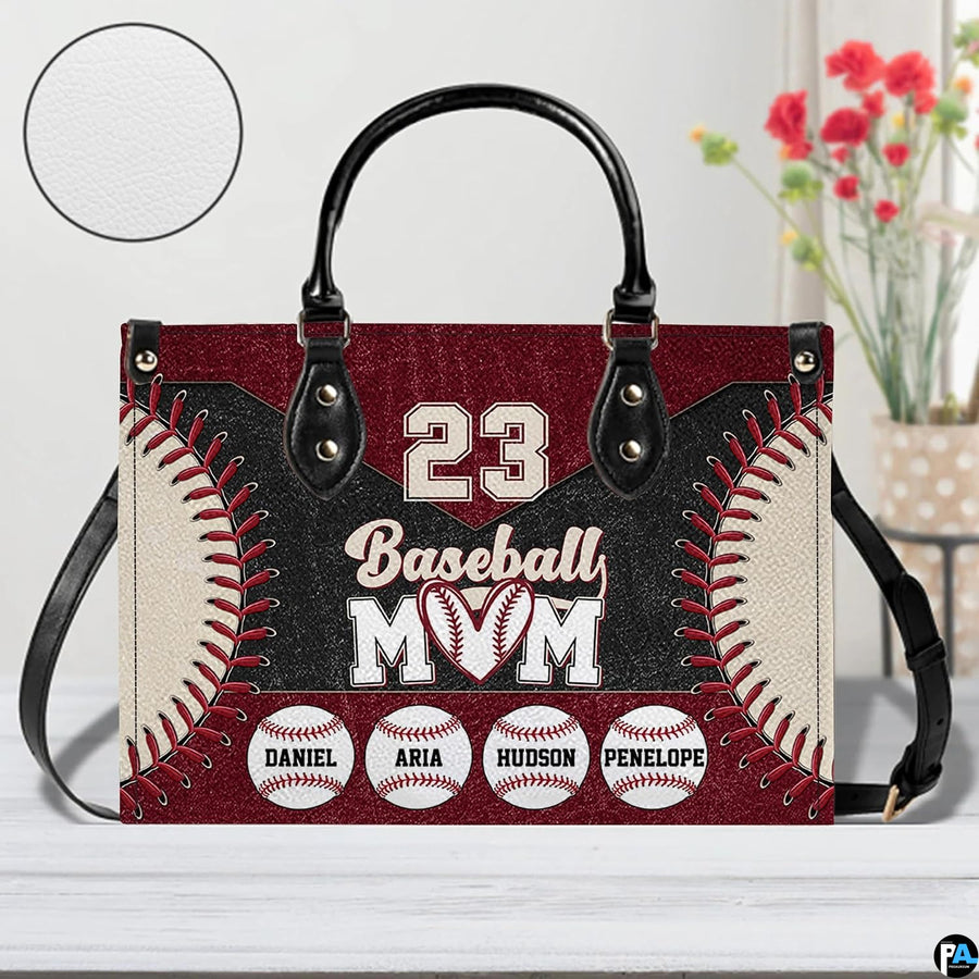 Alternative view displaying baseball handbag with dark trim and vibrant red lace graphics.