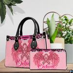 Pink angel wings art accessory arranged alongside matching companion accessory showcasing coordinated artwork.