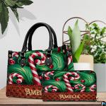 Coordinated accessory pair displayed on a wooden tabletop beside indoor botanical greenery.